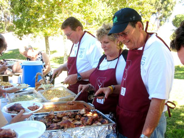 Bob Jensen, Judy and Jerry May serving